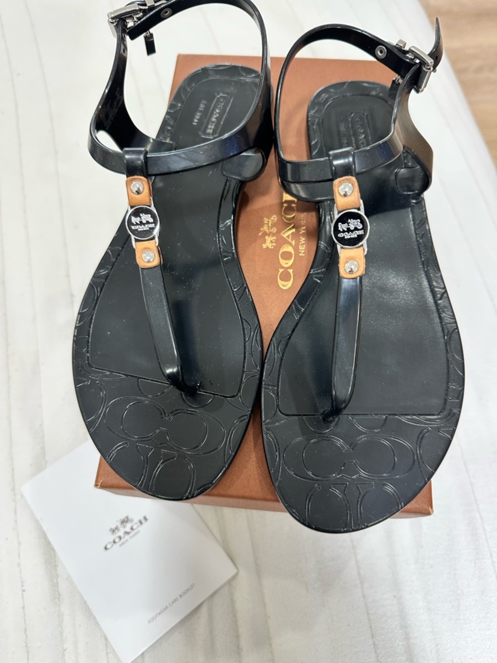 Coach Piccadilly Jelly Black T-Strap Sandals with Tan Logo Tabs